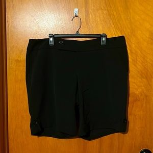 Torrid knee length dress shorts.